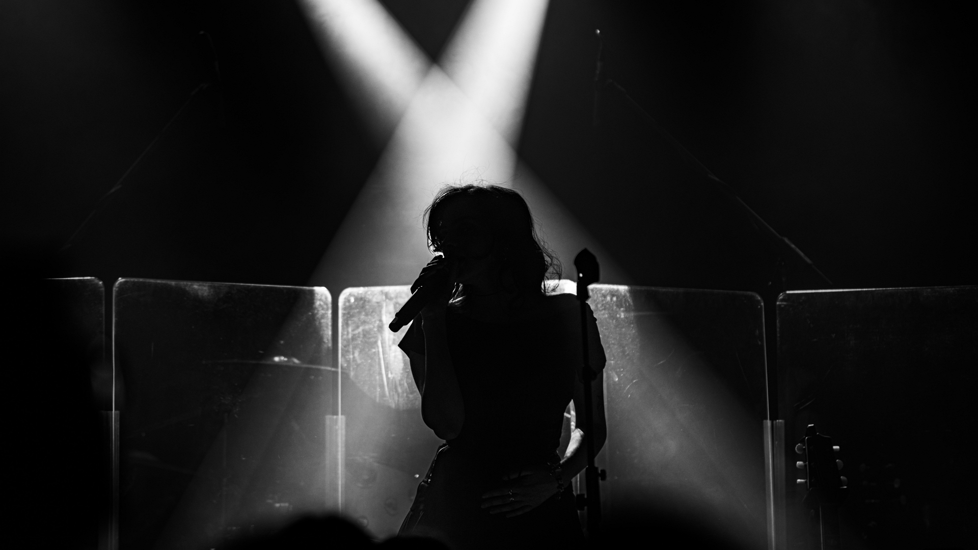 unsplash - female singer silhouette -