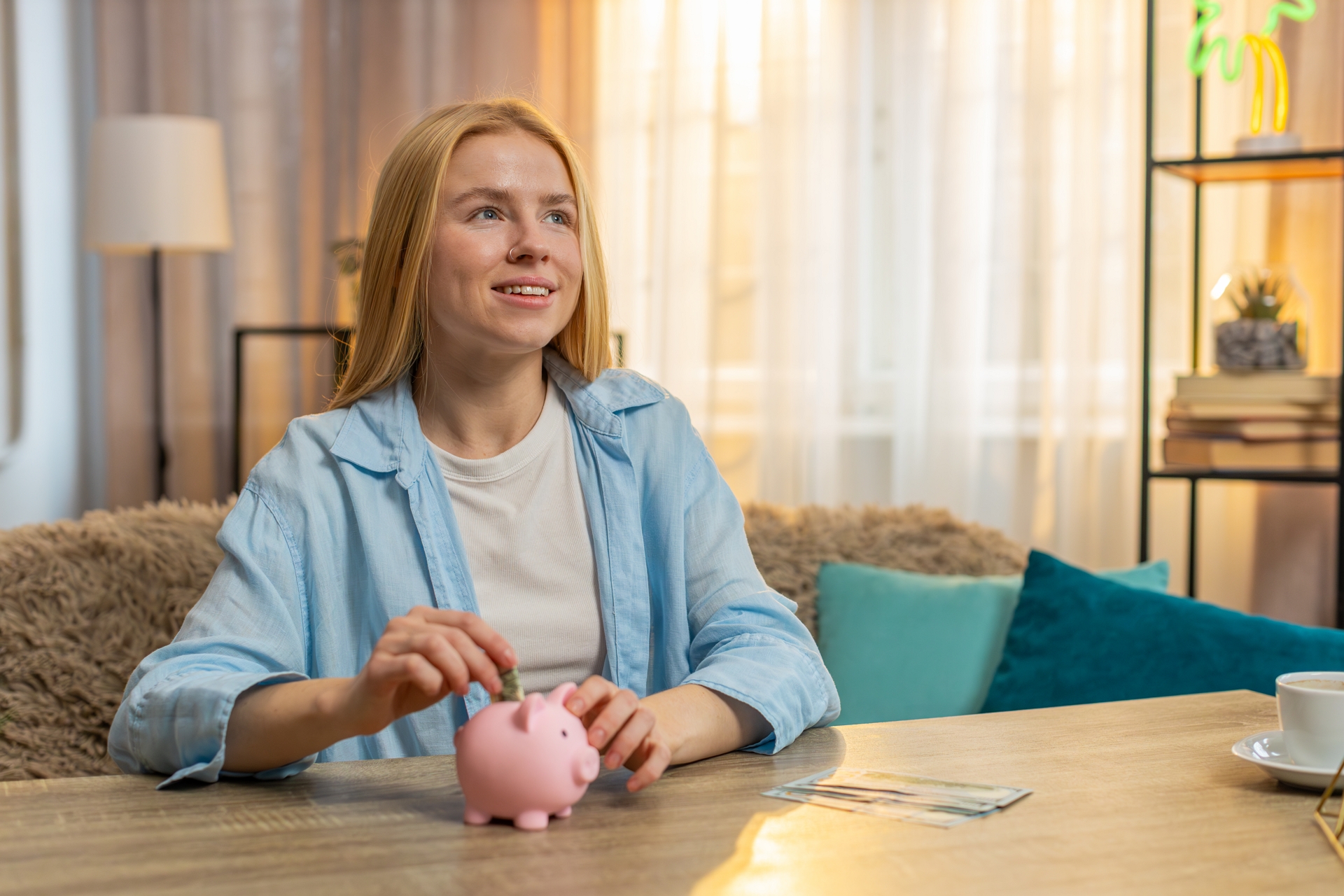 young-smiling-woman-saving-money-home-piggy-bank-deposit-future-planning-satisfied-mindset